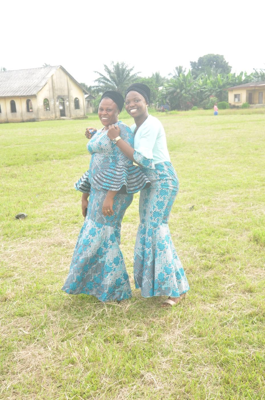 Members of the congregation worshipping in daylight.