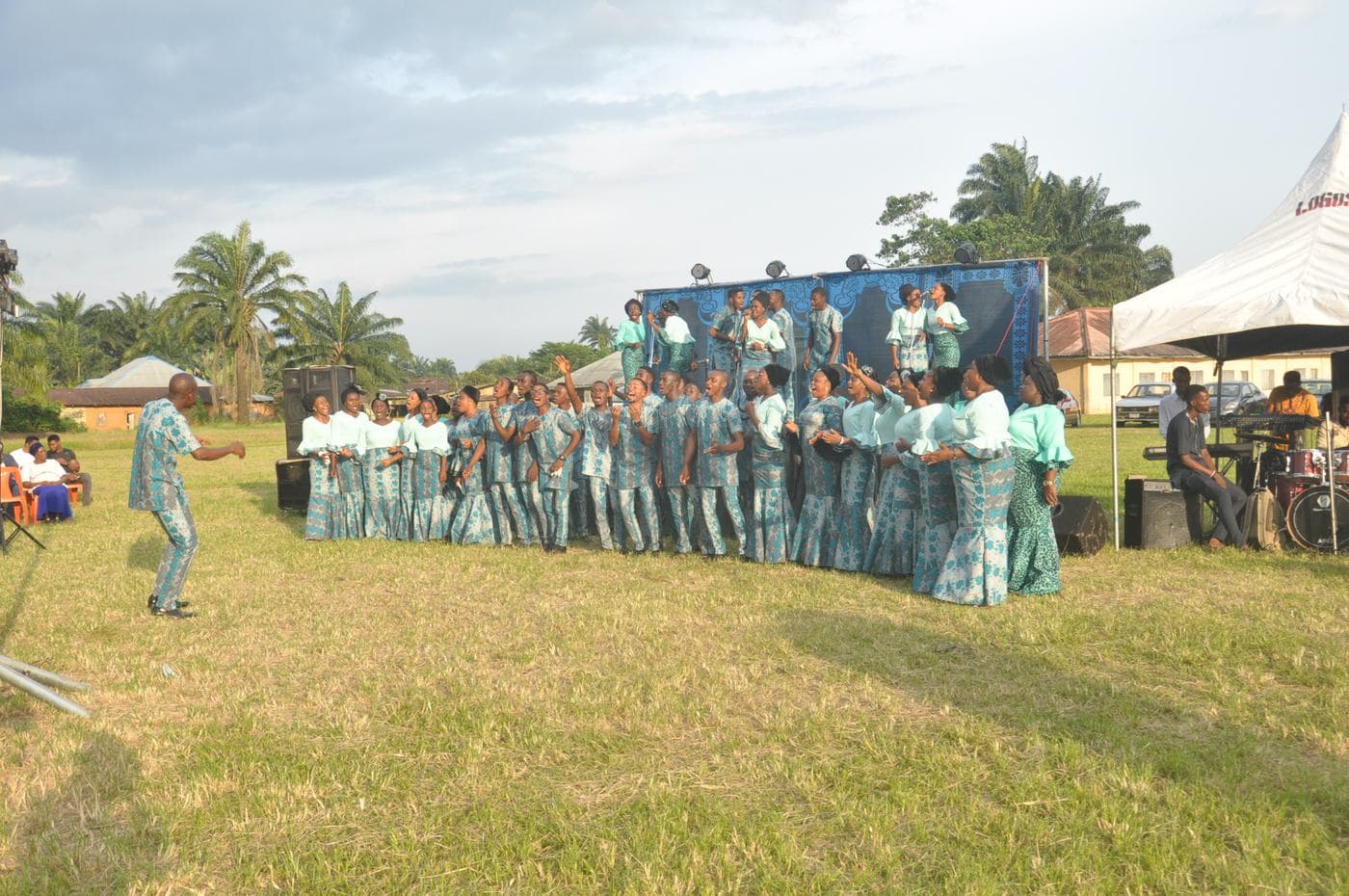 The choir gathered together on the field.