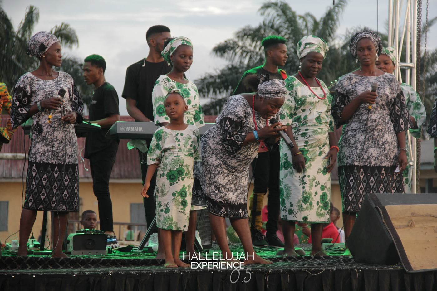 The choir singing together on stage.