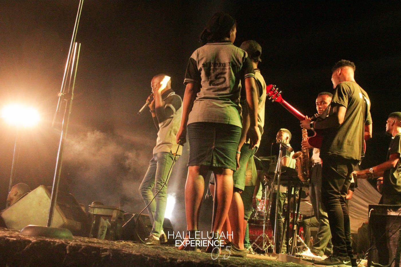 The choir singing together on stage.
