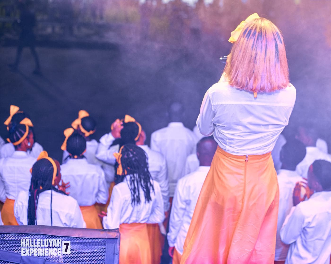 Children at the event, in white.