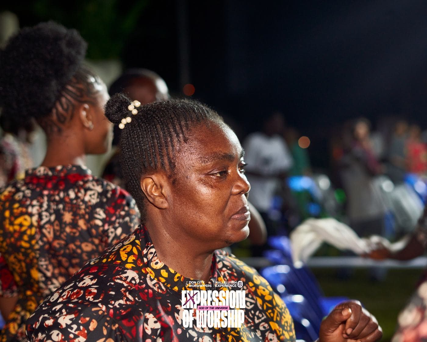 A candid moment among members of the crowd.