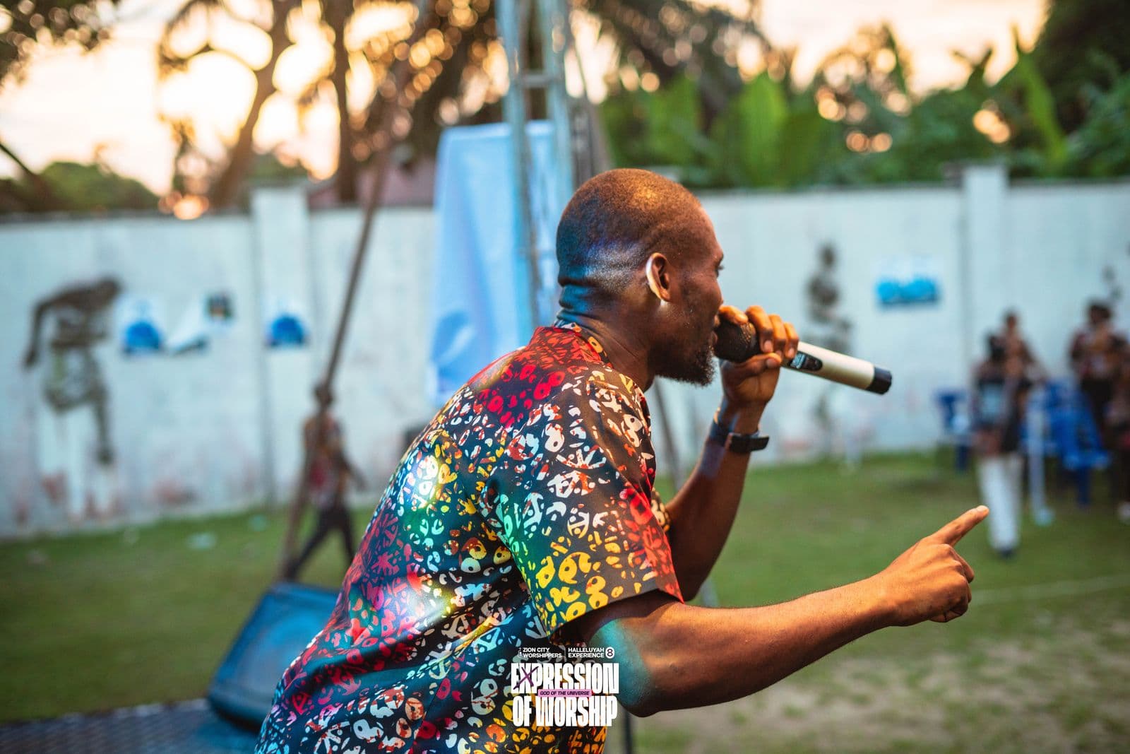 A soloist performing outdoors at golden hour.