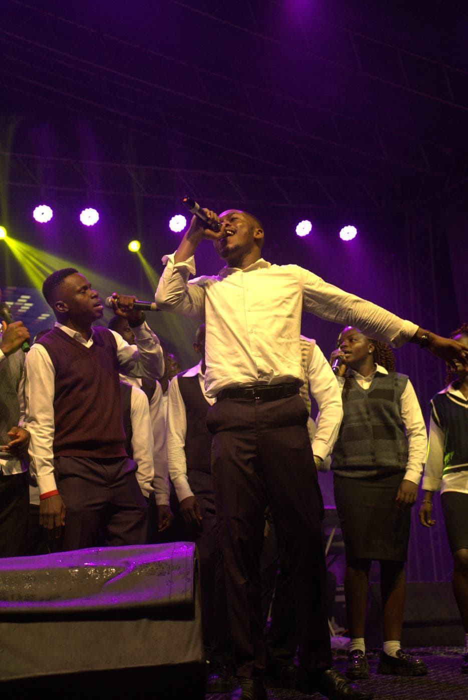 The full company gathered on stage.